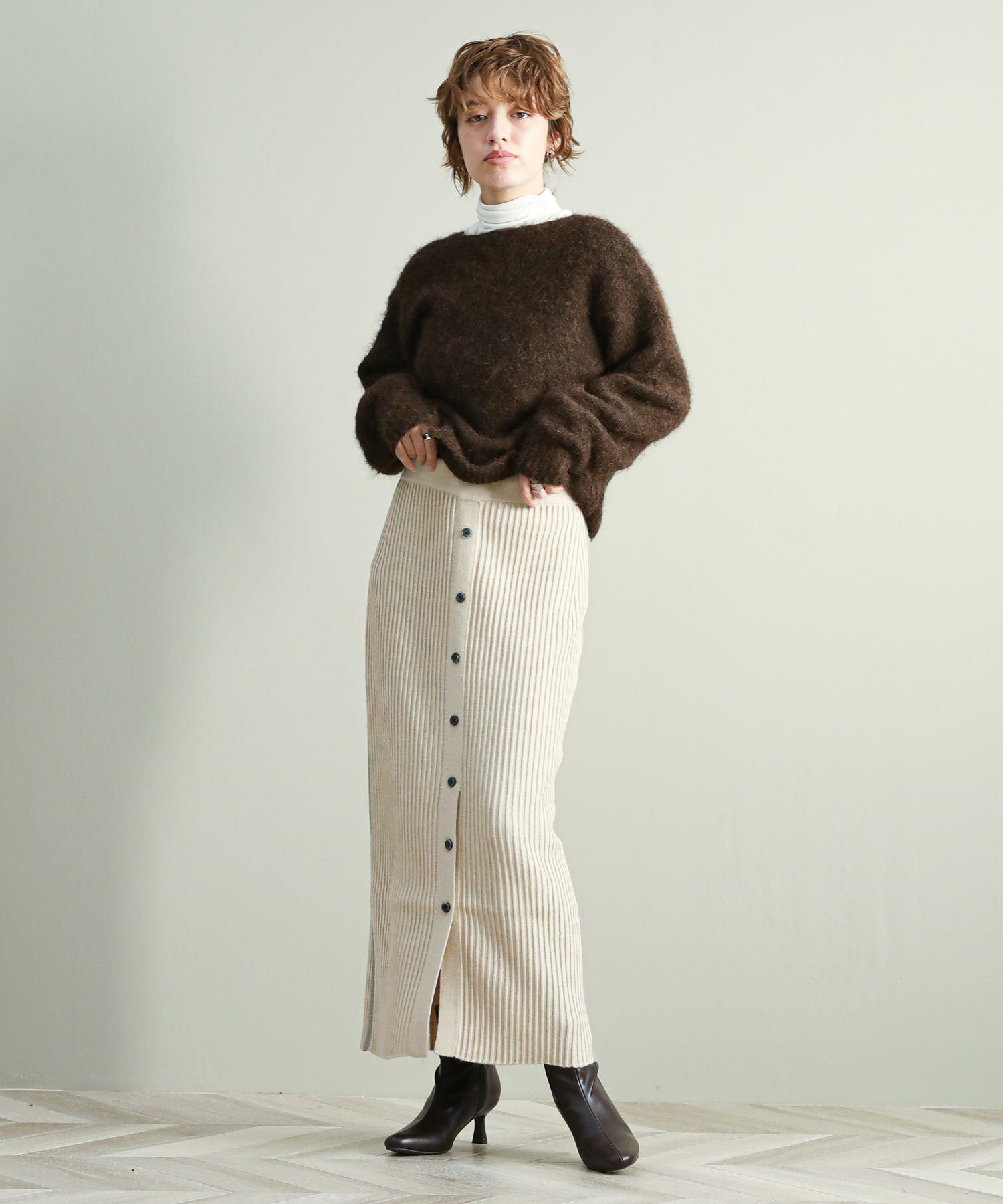 The rejoiceボタンスリットニットスカート【Boutique Ordinary